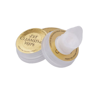 Pet cleansing wipes with gold labels on a light gray background