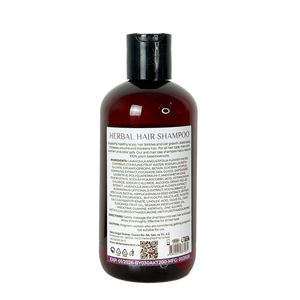 Bottle of herbal hair shampoo on a white background