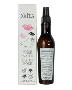 Bottle of Akita Rose Water with packaging on a white background