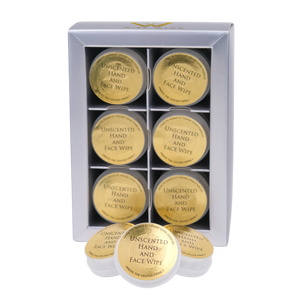 Set of unscented hand and face wipes in a white box with gold labels.