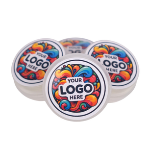 Four round stickers with colorful designs and 'Your Logo Here' text on a white background