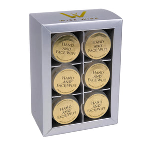 Silver box with six round containers labeled 'Hand and Face Wipe' on a white background.