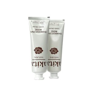 Two tubes of Damascena Rose Face Cream on a white background