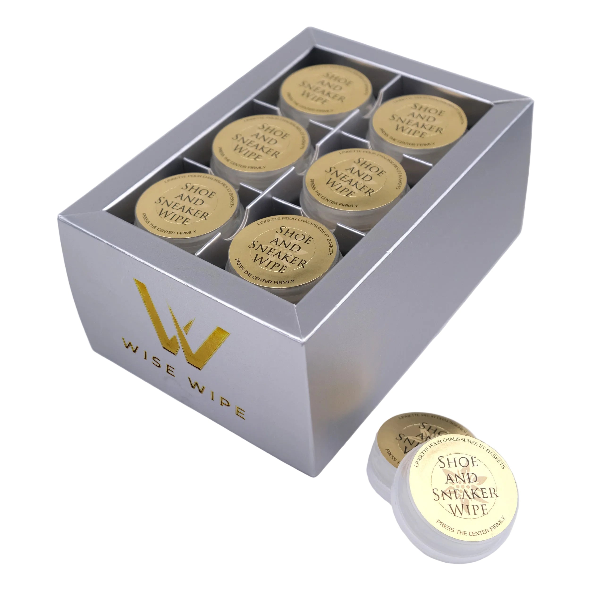Box of Wise Wipe shoe and sneaker wipes with a single wipe on a light gray background