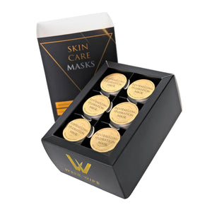 Box of skin care masks with gold labels on a white background