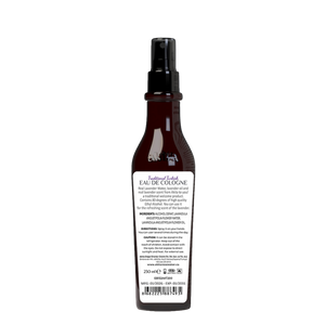 Brown cologne spray bottle with label on a white background