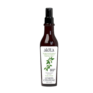 Bottle of akita Lemon Cologne on a white background