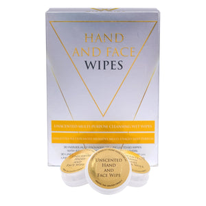 Box of hand and face wipes with two wipes in front on a white background