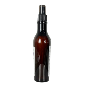 Brown spray bottle with black nozzle on a white background