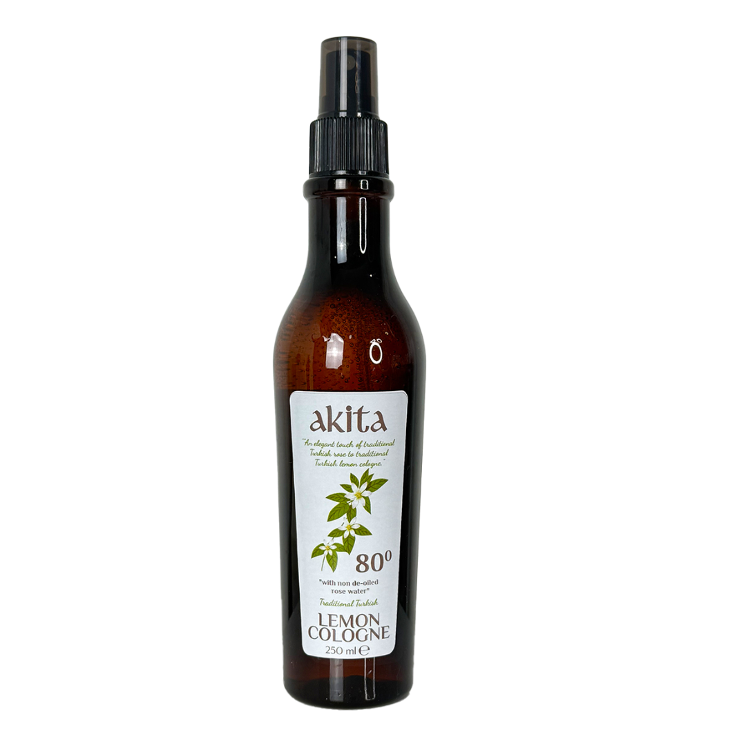 Brown spray bottle labeled 'akita' with a lemon cologne label on a white background