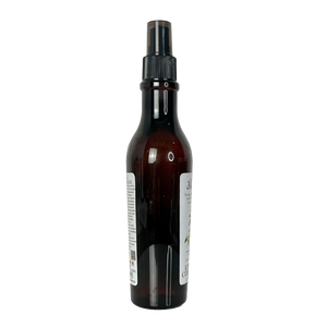 Brown spray bottle with a black nozzle on a white background