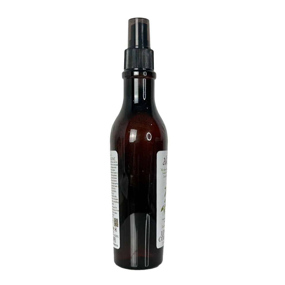 Brown spray bottle with a black nozzle on a white background