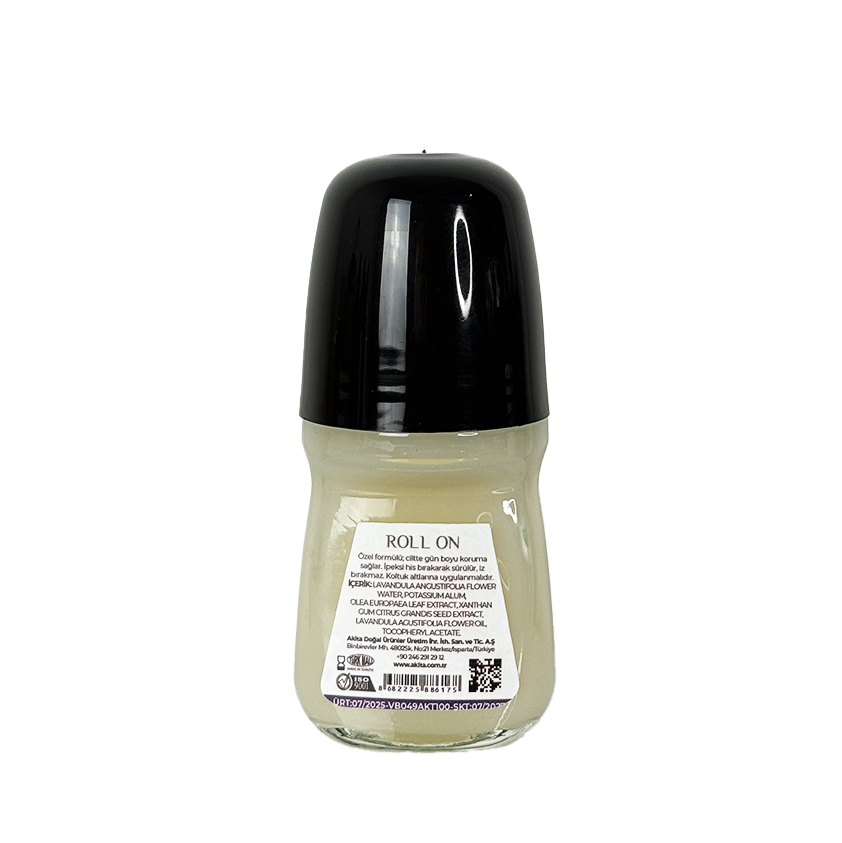 Green champagne bottle with gold foil cap on a white background