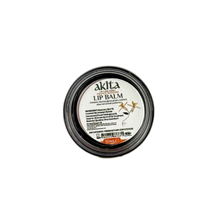 Lip balm container with visible brand name on a white background