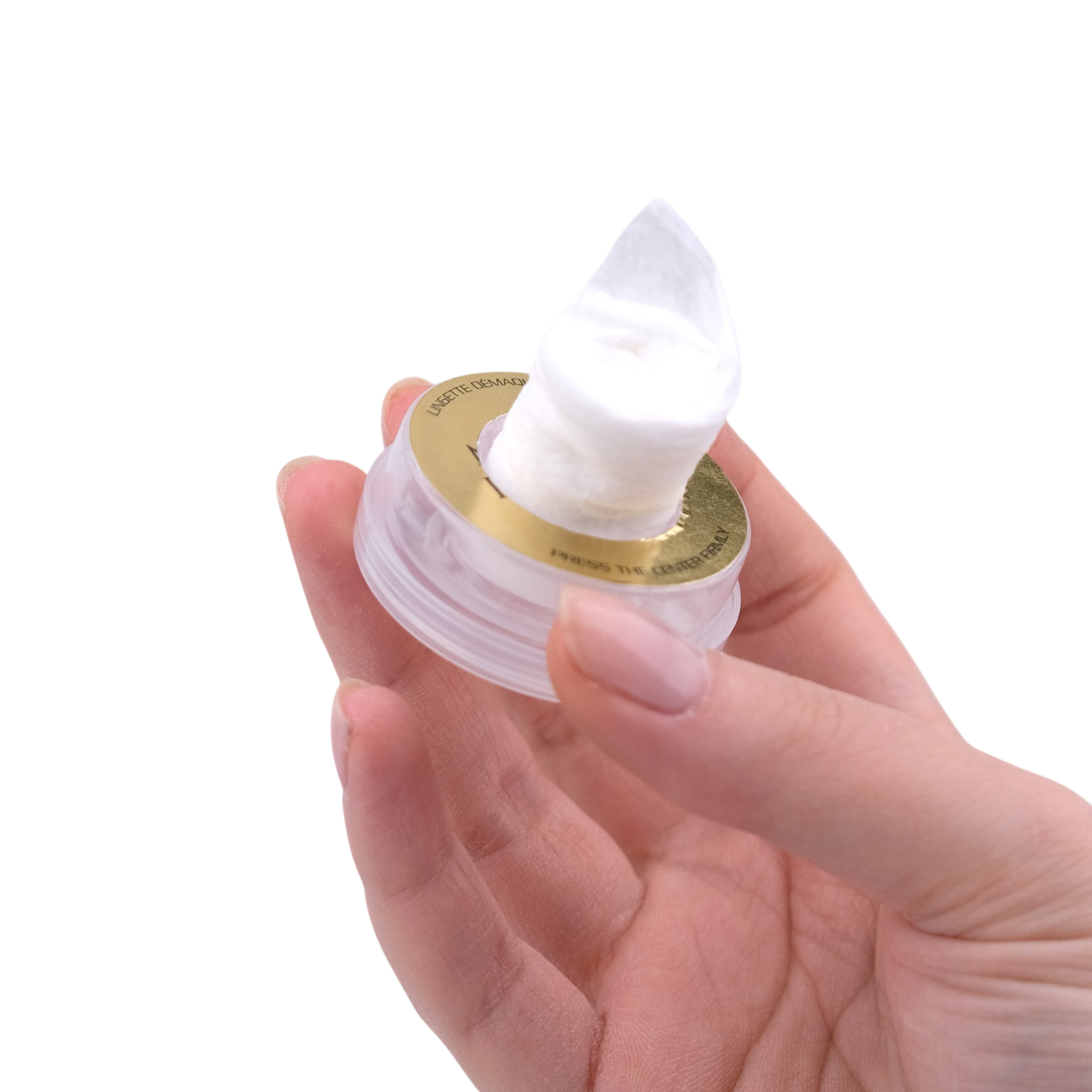 Hand holding a small container of white cream with a gold label on a white background