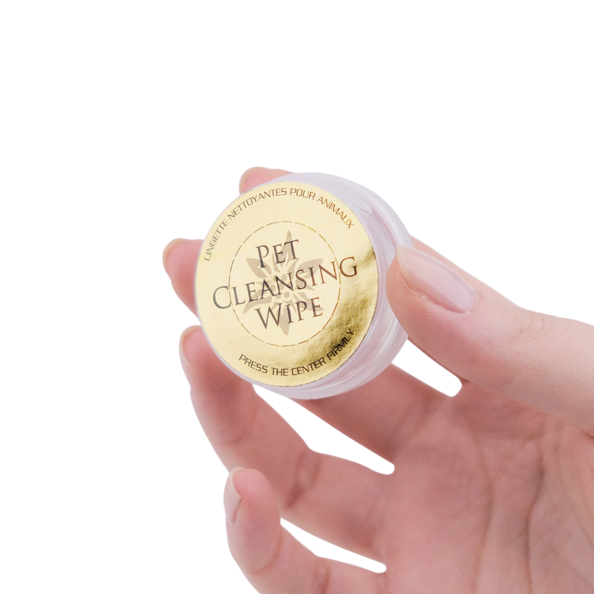 Hand holding a container of Pet Cleansing Wipes with a gold label.