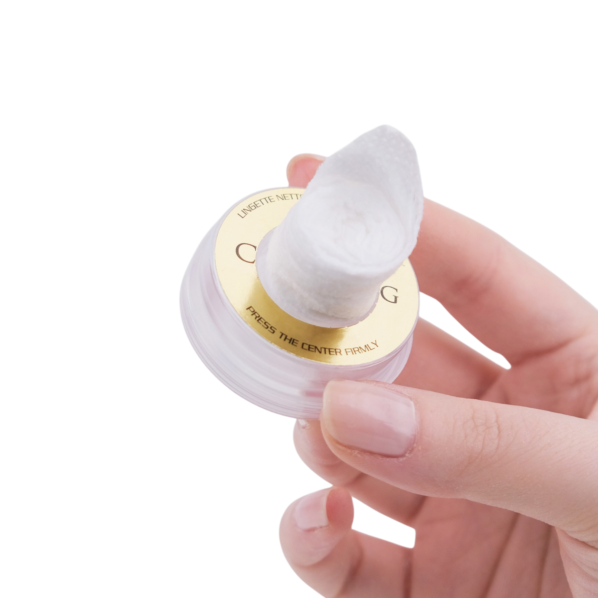 Hand holding a white cosmetic sponge with a gold logo on a white background